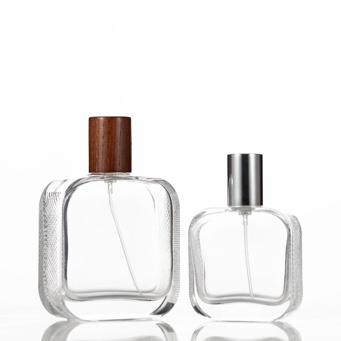 50ml and 100ml flint glass rectangular bottles with FEA 15 neck finish