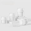 a group of white containers